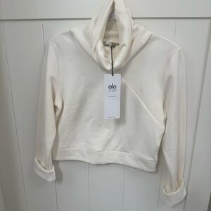 NWT Alo Yoga Soleil Long Sleeve top. Pristine. Medium